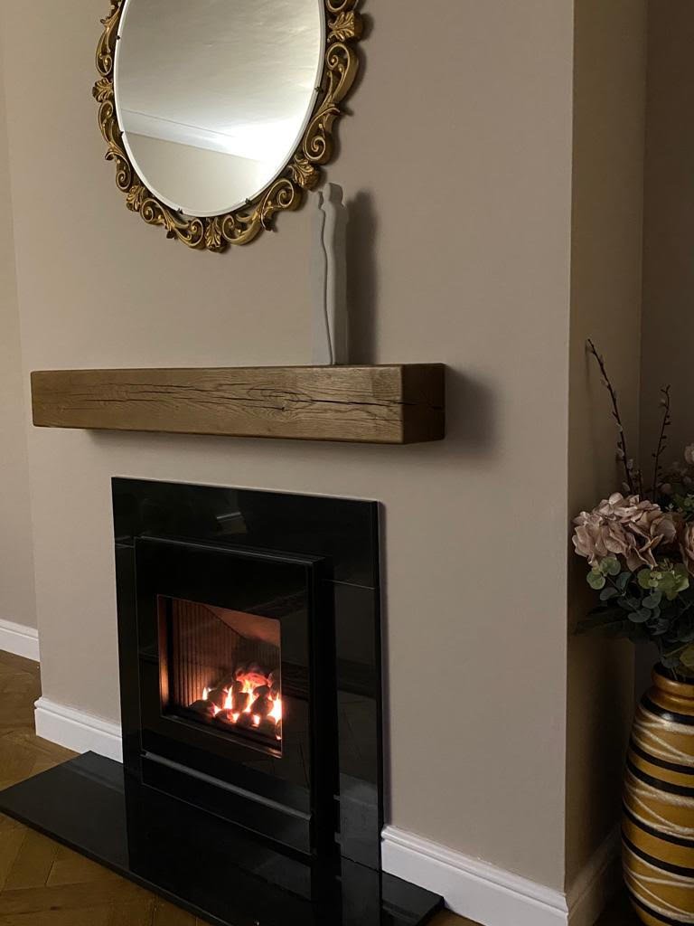 LogicHE with Designio2 black glass frame LogicHE with Designio2 black glass frame