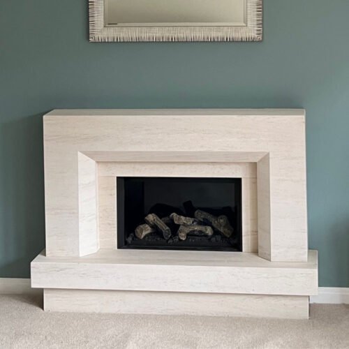 Riva2 600 + bespoke limestone fireplace